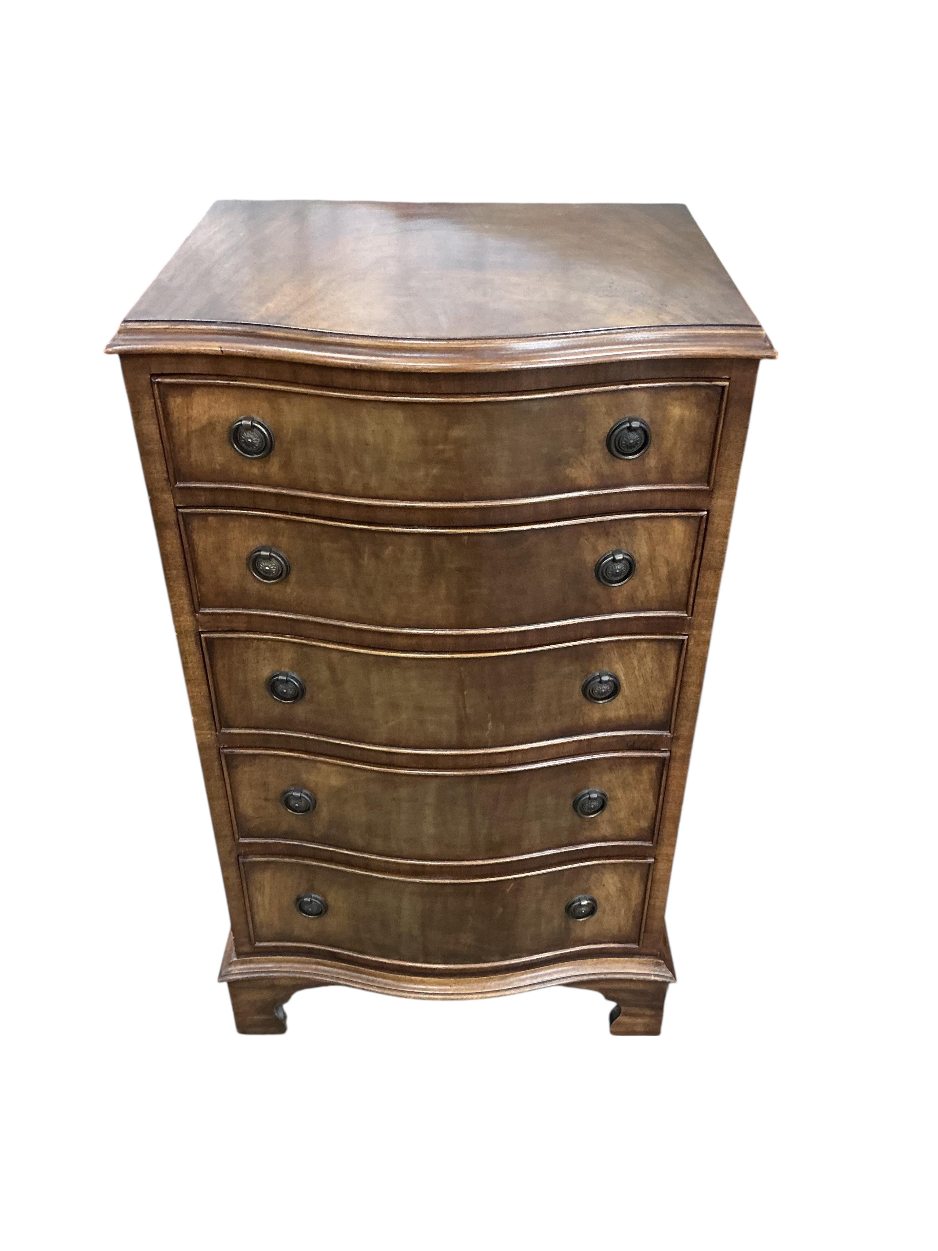A reproduction George III style mahogany serpentine chest of five drawers, width 54cm, depth 41cm, height 92cm